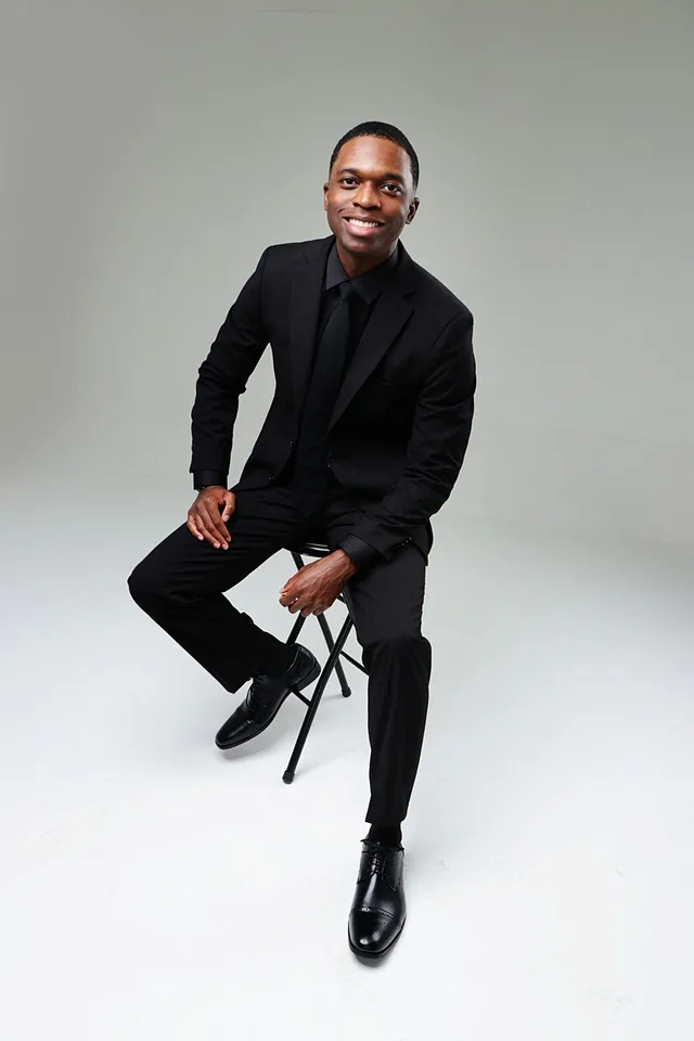 business man, portrait, black man, black suit, job interview, african american man, business man, job interview, job interview, job interview, job interview, job interview. Entretien d’embauche en Suisse: questions, tests et suivi
